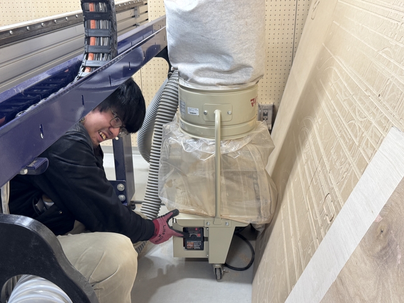 switch on the vacuuming machine