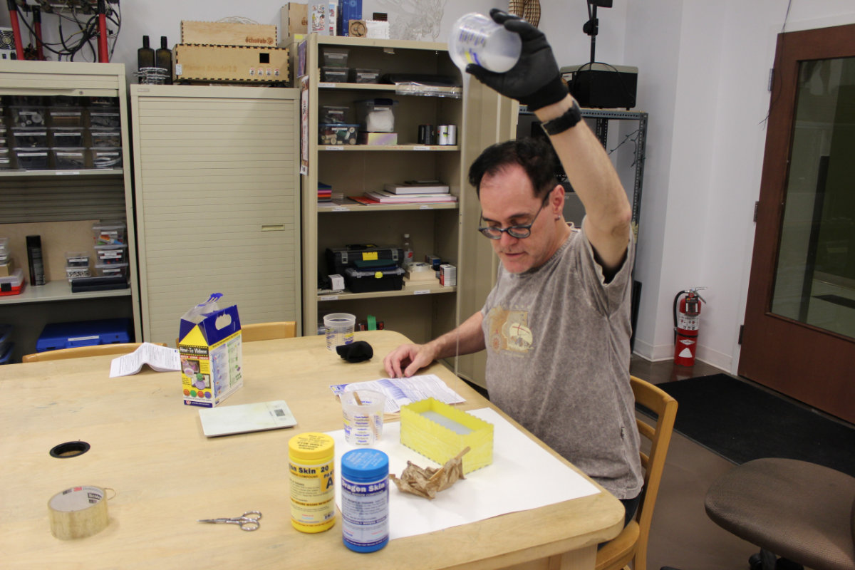 Pouring the silicone rubber into the mold