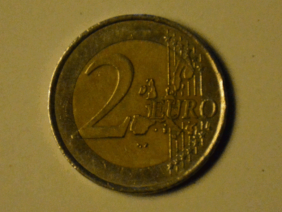 Coin as screw driver