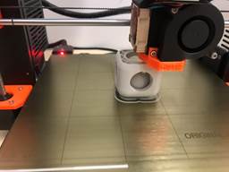 A picture containing indoor, floor, table, sitting
Description automatically generated