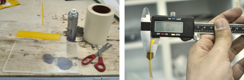 lab photo with 3d printers & measuring tool