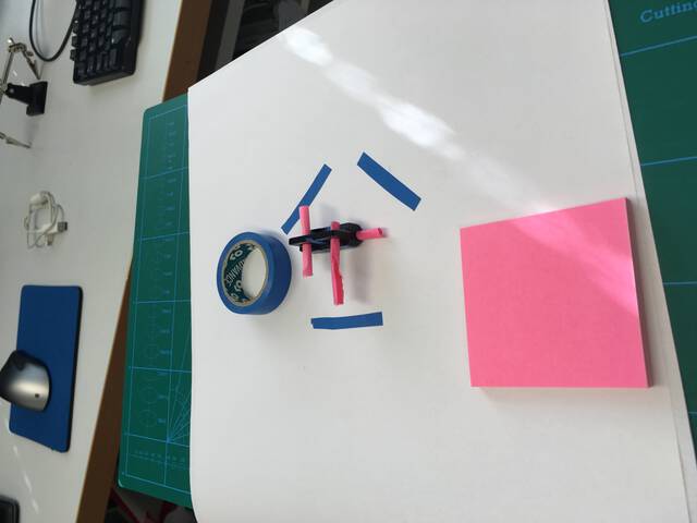 Strategically placed combo of Blue Tape, sticky notepad and couple of rolled papers into the cavities for identifying the holes