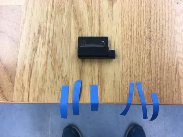 Coloured Tape to be stuck around the piece contours